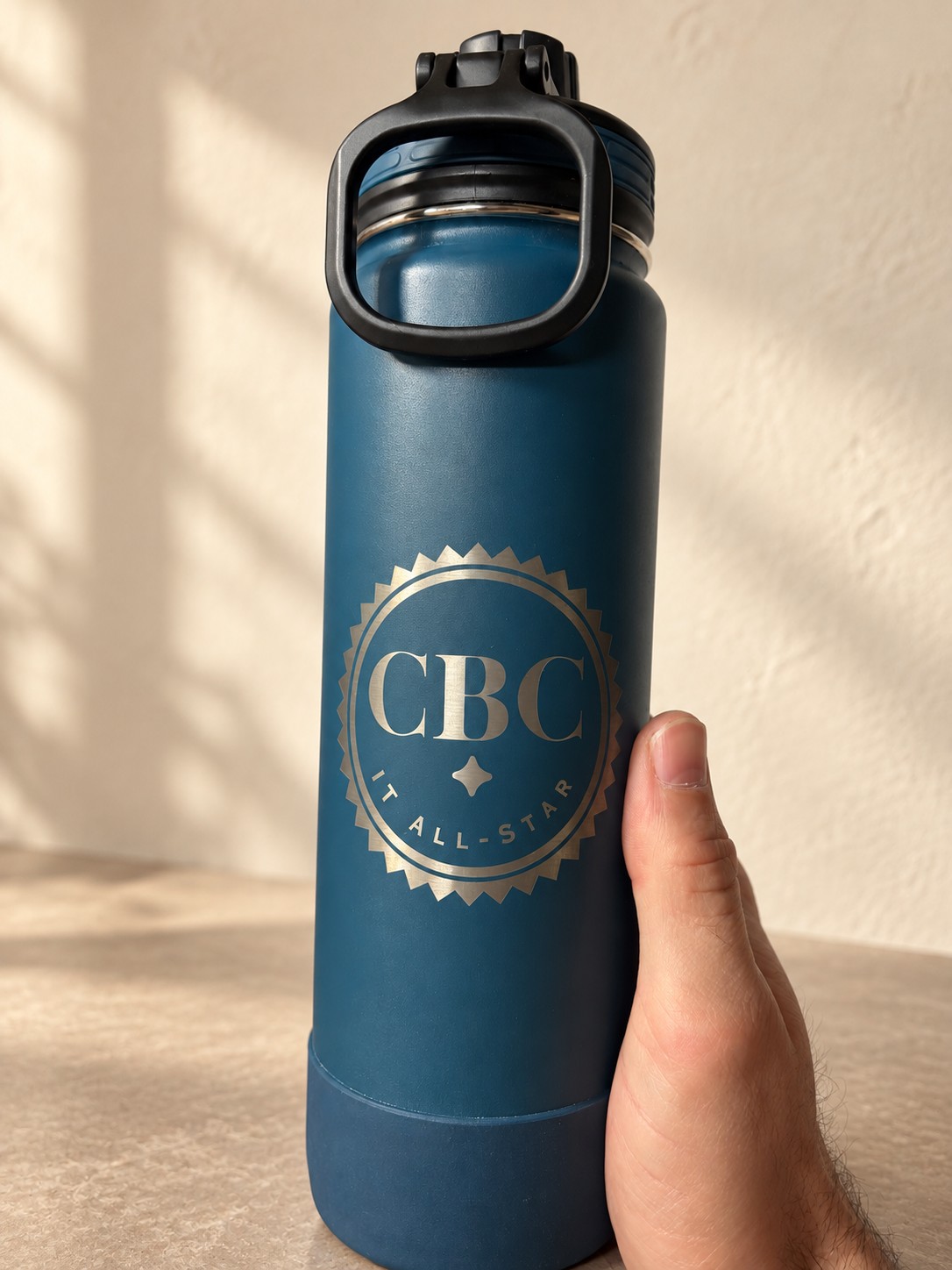 Team appreciation bottle — completed Clifton piece, digitally restyled background
